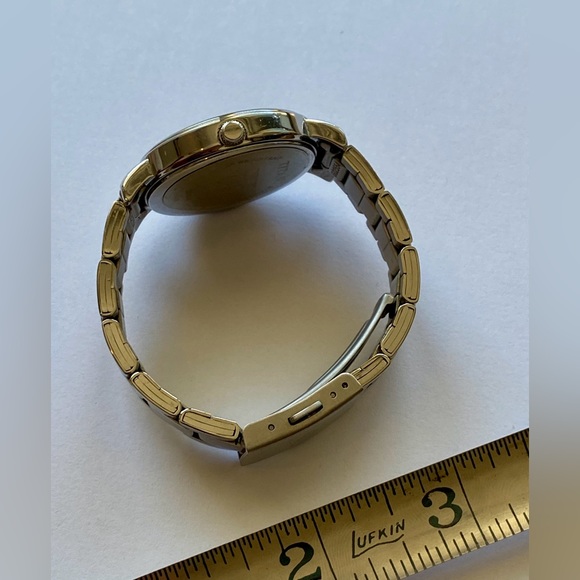 Titan Quartz Analog Watch – Brown Dial, Stainless Steel Strap (Women's) - Picture 7 of 8